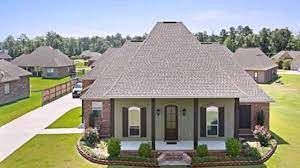 Acadian style house plans fit well in the south, though they'd look great in many other regions as very similar to french country style house plans, acadian home designs typically use brick and. Acadian Style Homes Youtube House Plans 92385