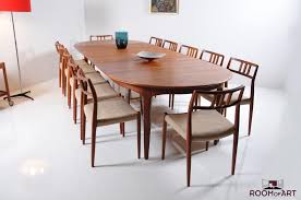The soft lines give this dining table a strong aesthetic impact which shows that this is a piece of furniture of enormous value. Large Dining Table By Henning Kjaernulf Room Of Art