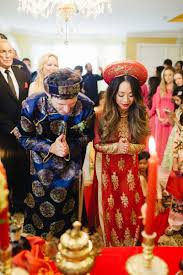 Real Weddings Real Wedding Photos In Florida Weddingwire Com Vietnamese Wedding Vietnamese Wedding Dress Ao Dai Wedding