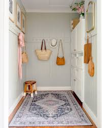 A padded bench makes it easy to put on shoes, while bountiful hooks hold jackets, bags, and leashes. Mudroom Ideas For Storage Organization Extra Space Storage