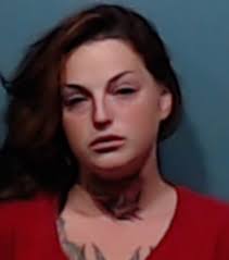 Abilene woman arrested for allegedly trying to hit boyfriend with car