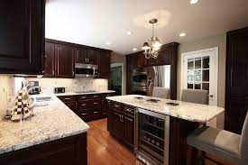 Dark kitchen cabinets and countertops with white backsplash. Dark Cabinets Kitchen Design Ideas Pictures Remodel And Decor Dark Wood Kitchen Cabinets Contemporary Kitchen Espresso Kitchen Cabinets