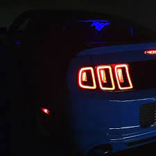 2011 2014 Mustang Coupe Glowplate Running Pony Lighted In Blue This Is A Must Have For Your New Mustang New Mustang Mustang Iphone Wallpaper Mustang Coupe