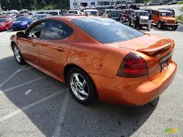 Image result for Sunburst Orange 2004 Pontiac
