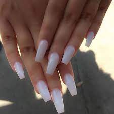 Just because you're working with acrylic nails that have the potential to be coloured, bedazzled, and generally embellished doesn't mean you have to create a bright, complicated look. Soft White Acrylic Nails Nail And Manicure Trends