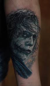 Joker tattoo is probably one of the most popular tattoos among the comic fans. Heath Ledger Joker Tattoo Inkstylemag Joker Tattoo Tattoos Movie Tattoos