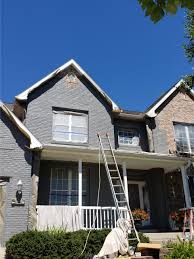 Gray house exterior paint colors for home home construction house exterior new home construction house siding house painting new homes exterior house color. Brick House Painted With A Customized Beautiful Gray Color Reardon Painting