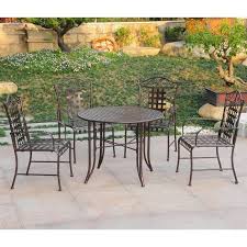 Complete your patio set with this sturdy aldrich cast iron free standing umbrella base. International Caravan Mandalay 5 Piece Iron Patio Dining Set In Bronze 3454 Hd Bz