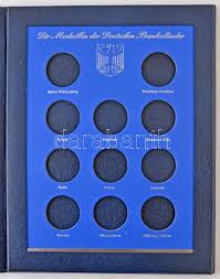 Ez a szócikk szaklektorálásra, tartalmi javításokra szorul. Album Nemetorszag Tartomanyai Emlekermek Darabanth Numismatic Auctions