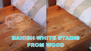 Applying heat to remove the spots. Iron Out White Water Stains From Wooden Furniture Youtube