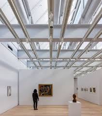 The Only Top Lit Gallery Is On The Eighth Floor Where Sawtooth Skylights Provide The Kind Of Diffuse Glow For Which Whitney Museum Museum Interior Renzo Piano