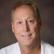 Dr. Travis Slade, MD