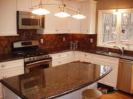 Here we share our gallery of white kitchen cabinets with dark countertops including a variety of finishes, materials and design ideas. Tan Brown Granite Countertops Pictures Cost Pros And Cons