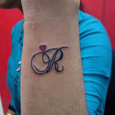 Tattoo of initials s and r for my kids formed with a heart. 70 Amazing R Letter Tattoo Designs And Ideas Body Art Guru