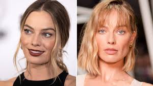 Cirurgião plástico decifra procedimentos estéticos que transformaram rosto de Margot Robbie e desagradaram fãs