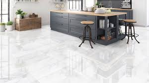 This tile features elegant white tones with a splash of grey and streaks of gold. Calacatta Marble Tiles How To Achieve A Calm Bathroom With Calacatta