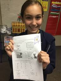 March praise card winner is 6th grader Payton Burrell. She chose Mrs. Becky  Wiley, her math teacher, to take with her to Johnny's.