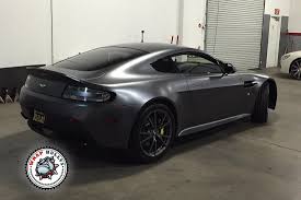 Car wraps in san diego. Aston Martin Vantage Wrapped In 3m Satin Dark Gray Call Today For Pricing On Your Car Wrap Car Wrap New Trucks Car Accessories