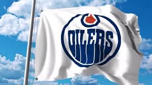 The edmonton oilers are a professional ice hockey team. Waving Flag With Edmonton Oilers Nhl Hockey Team Logo 4k Editorial Clip Stock Video C Alexeynovikov 158053142