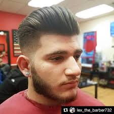 Repost @lex_the_barber732 with @repostapp・・・Pomposaurus Rex!!!! Love doing  this cut. Classic pompadour with a mid skinfade styled with  @layriteofficial natural matte creme #bgbarbershop #midskinfade #pompadour  #pomp #bearded #beardtrim ...