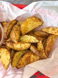 Add olive oil and season. Light And Crispy Air Fryer Potato Wedges Recipe Diaries
