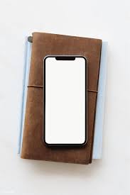 Download Premium Png Of Phone On A Leather Diary Mockup 2030396 In 2020 Leather Diary Doodle Frame Phone Template