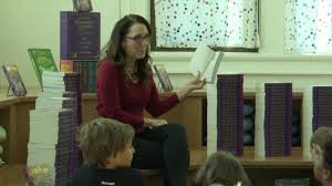 KPAX “If You Give a Child a Book” campaign visits Lowell Elementary School