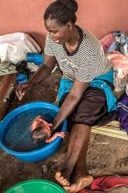 How do i give my newborn a bath? Bathing A Newborn Baby Stock Image C037 6748 Science Photo Library