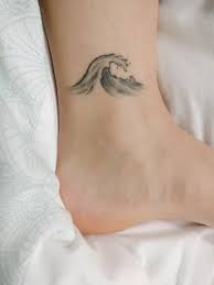 Wave Tattoo On The Ankle Wave Tattoo Ankle Waves Tattoo Wave Ankle Tattoo