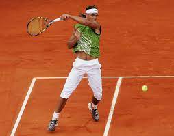 Check out rafael nadal's elegant outfit for australian open 2021 published 01/16/2021, 1:43 pm est rafael nadal of spain hugs the musketeers' cup as he celebrates victory following the mens singles final against dominic thiem of austria during day fifteen of the 2018 french open at roland garros on june 10, 2018 in paris, france. Piratas Long Hair And Sleeveless Tops See Rafael Nadal S 13 Year Evolution Of Tennis Fashion Tennis Fashion Mens Crop Tops Boys In Crop Tops
