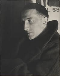 Woman is using credit card to pay for online delivery. Marcel Duchamp Wikipedia