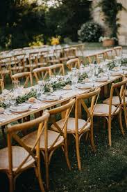 Stylish Country Chateau Wedding With Long Wooden Tables Crossback Chairs Greenery Runner A Rustic Wedding Table Tuscan Inspired Wedding Table Runners Wedding