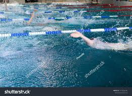 Swimming Sport Event Splashed Water In The Pool During Competitions With Children Adolescents And Adults Ad Aff Sp Swimming Sport Sport Event Swimming