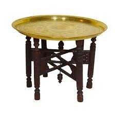 This wooden folding side table distinguishes itself with beautiful teal paint. Lot Art Antique Anglo Indian Style Brass Tray Table On Folding Stand