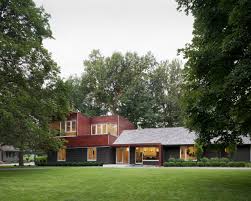 Instead of moving the front steps to the outside of the porch, they erected the gable style roof over them giving this a very unique look. Modern With A Side Of Ranch By Hufft Projects