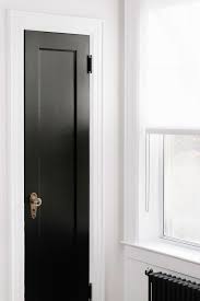 This Bright Brooklyn Apartment Carves An Extra Room Out Of Thin Air Black Interior Doors French Doors Interior Brooklyn Apartment