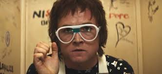 Watch the new trailer now! Rocketman Images Offer New Look At Taron Egerton As Elton John Film