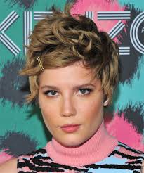 Bubble curls and soft ringlet bangs add a lively vibe to this jaunty pixie. Short Hairstyles For Wavy Hair
