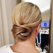 This version is a great look for longer hair. Get Inspired By This Fabulous Simple Low Bun Wedding Hairstyle