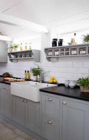 Picking the right worktop for your kitchen can be difficult, especially because there are so many options in terms of colour and materials. Black Worktop And Grey Units Kitchen Renovation Kitchen Remodel Kitchen Design