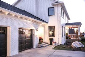 Right now our home is pretty much maintenance free and we really didn't want to trade that for all the upkeep of painted brick. White Painted Brick House Before And After The Idea Room