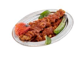 Beef, chicken or mutton kebab wrapped in a layered porota, marinated in spices. Halep Kebabi Antep Sofrasi