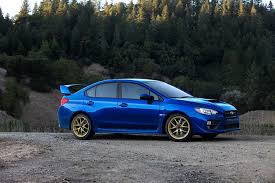 You have sonic blue mica world rally blue (99 rs) 555 nah, it's just that blue + gold is the official subaru color. Subaru Wrx Sti Unveiled With Limited Edition Model Wardsauto