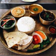 A Typical Nepalese Cuisine Dal Bhaat Tarkari Roti Achar Papad Salad Nepali Food Healthy Main Meals Indian Food Recipes