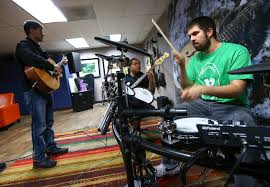 El compa ivan y sus aleados. Gus Garcia From Left Christian Anorve And Ivan Delgado Of Broken Spectacles Perform During Band Practice At The Blind Center In Las Vegas On Thursday May 4 2017 Chase Stevens Las Vegas Revie