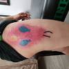 'ink sacs' are a normal part of the healing process, and occur when specialist plastic is covering the tattoo, called saniderm. 3