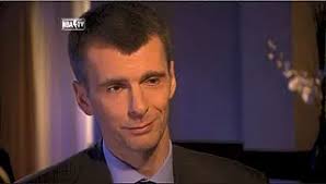 Mikhail Prokhorov: Cleaning out the closet with a confident smirk