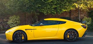 Image result for Sunburst Yellow 2012 Aston Martin