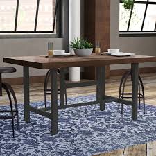 The table height is typically between 28 and 30 inches. Williston Forge Charline Standard Height Dining Table Reviews Wayfair Dining Table Dining Table In Kitchen Solid Oak Dining Table