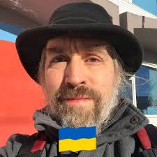 Does particle-wave duality imply particles turn into functions?